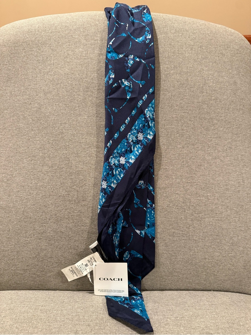 Coach Navy Tie with Teal Floral Pattern